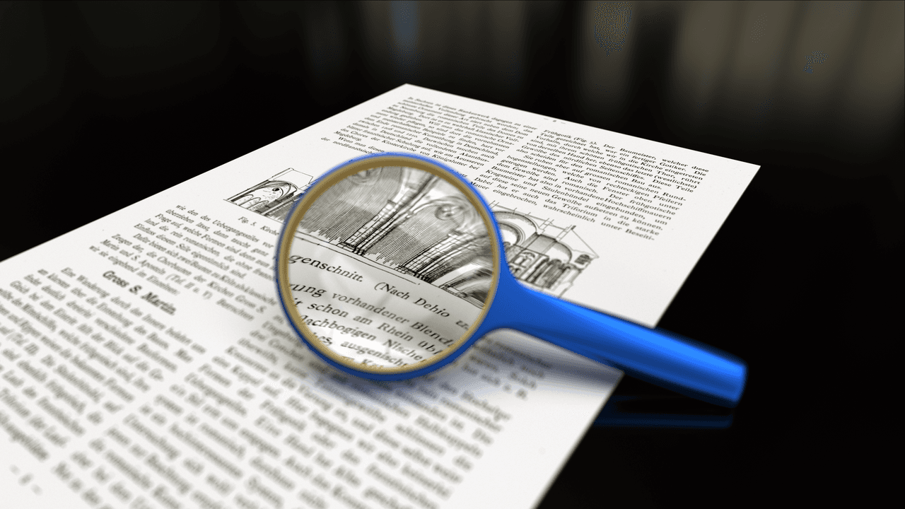A magnifying glass over paper, symbolizing fact-checking