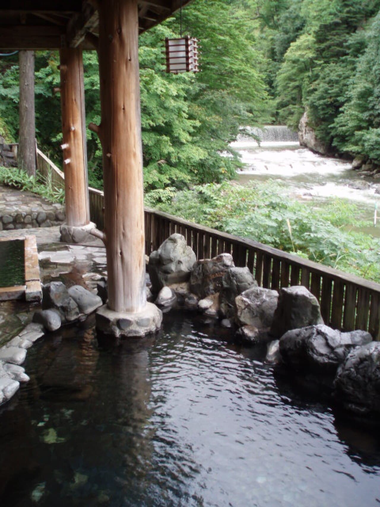 An outdoor onsen hot-spring bath (rotenburo) in Japan