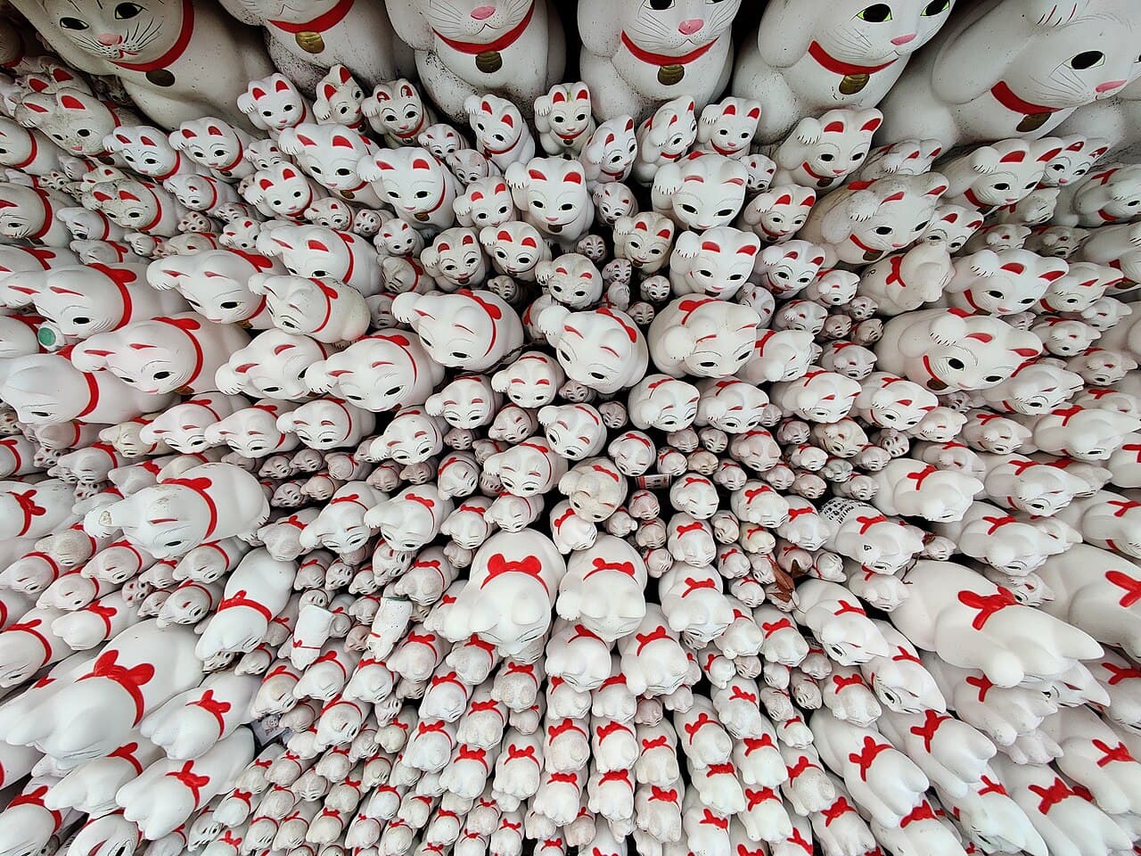 Maneki-neko (lucky cat) statues at Gotokuji Temple, Tokyo