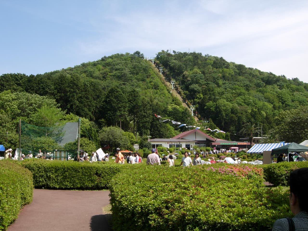 The single-seat Komuroyama chairlift climbing to the summit of Mt. Komuro in Ito, Shizuoka