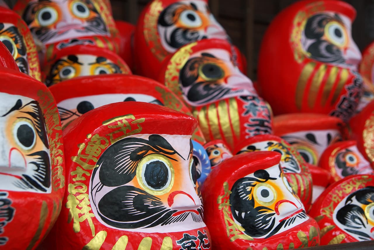 Rows of red daruma dolls on display at Shorinzan Daruma-ji temple in Takasaki, Gunma